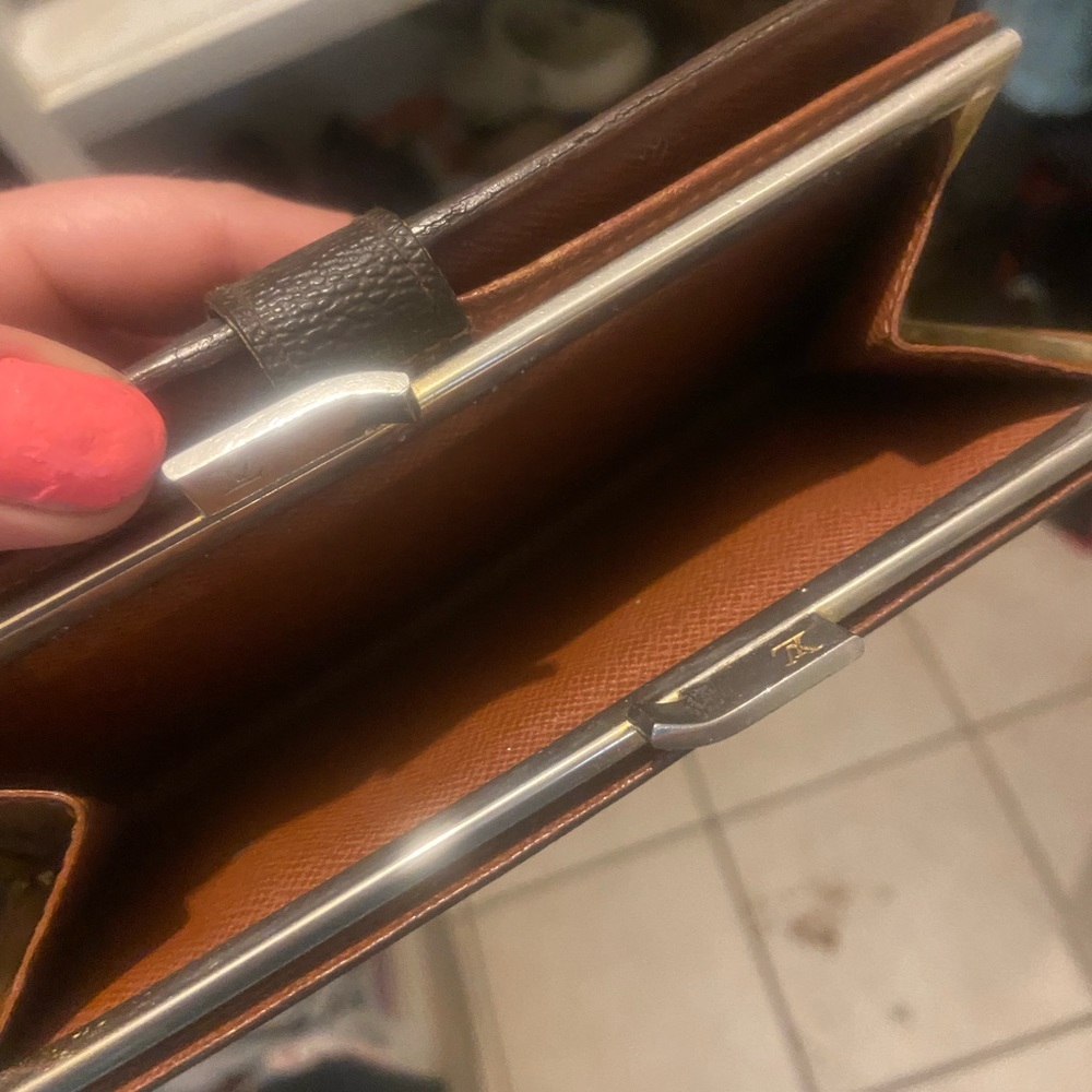 Vintage Louis Vuitton wallet.